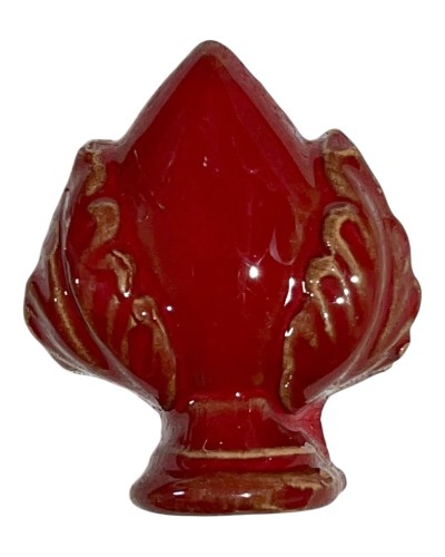 Calamita pumo rosso intenso con venature dorate su sfondo oro brillante