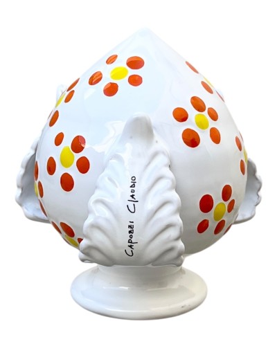 Bomboniera Pumo Poz Studio con decoro fiori arancio in ambientazione tipica pugliese al tramonto