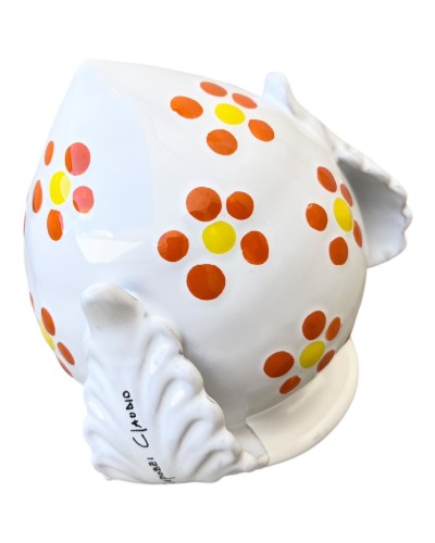 Bomboniera Pumo Poz Studio con decoro fiori arancio in ambientazione tipica pugliese al tramonto