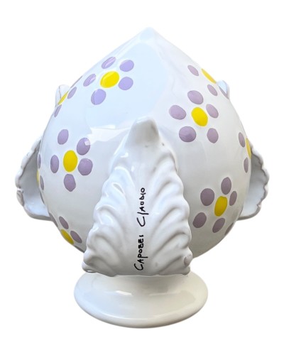 Pumo pugliese Poz Studio con fiori color glicine a rilievo in ambientazione artigianale